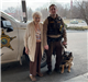 A Polk County deputy and Rex pose with an area resident.