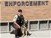 K9 Rex poses with a Polk County Deputy on his first day.