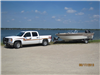 Monarch Boat pulled by Sheriff Truck