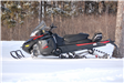 A Black Snowmobile on the Snow