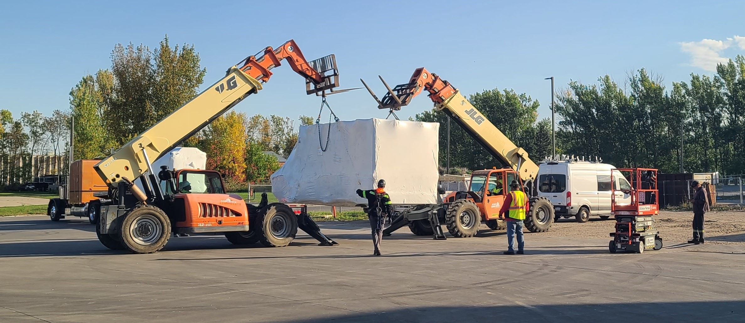 Polk RRF staff unloading the bag opener
